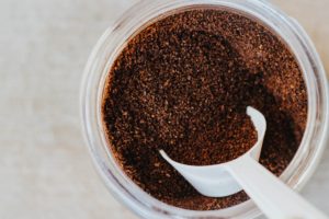 coffee grains with white scoop