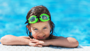 girl playing in the pool