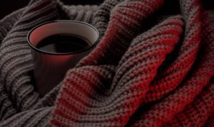 Cup of coffee and blanket