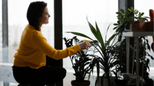 Lady checking on her plants