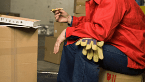 man having a pizza break